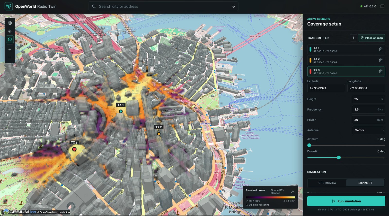 OpenWorld Radio Twin explorer over central Boston with a Sionna RT received-power map draped onto the 3D scene